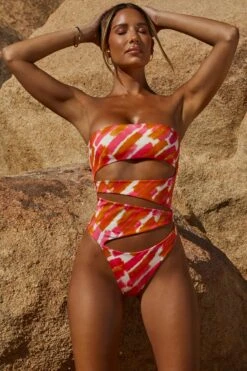 Cut Out Strapless Thong One Piece In Pink Print 19 Cut Out Strapless Thong One Piece In Pink Print -Neena Swim NS0151 1 Pink Print Strapless One Piece Swimsuitcopy